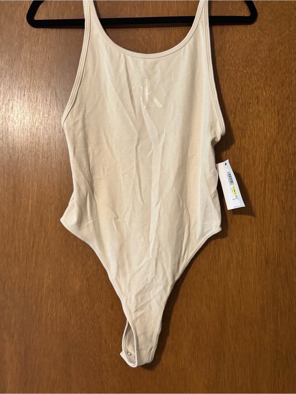 2/$25 Calvin Klein  Cream/Tan One-Piece Bodysuit